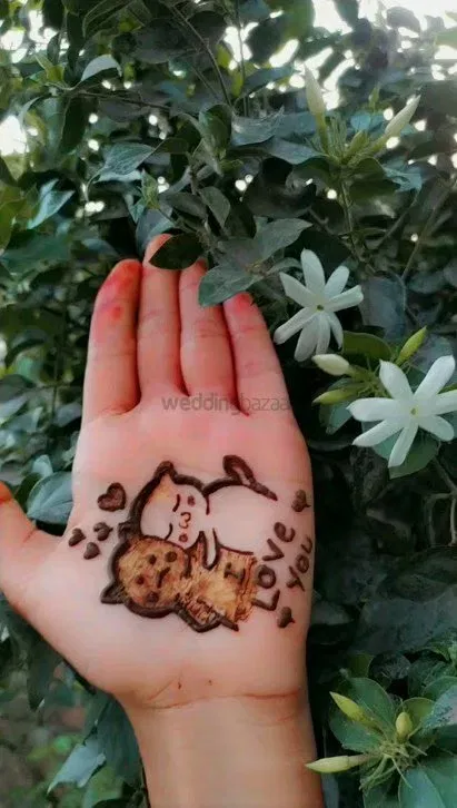 Simple Front Hand Mehndi Design with Figures and Hearts (2)