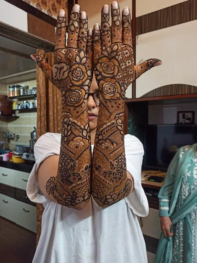 Back Hand Mehndi Design with Figures