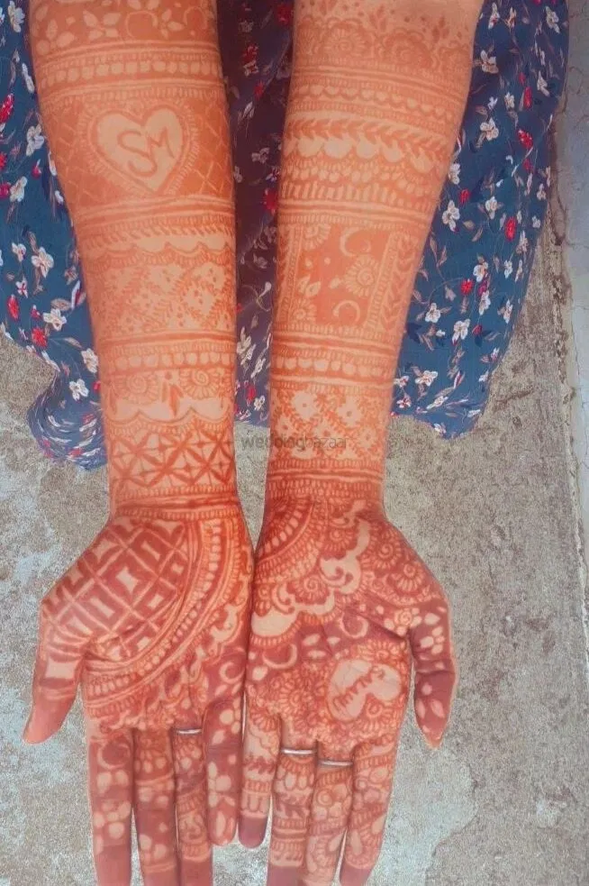 Back Hand Mehndi Design with Figures