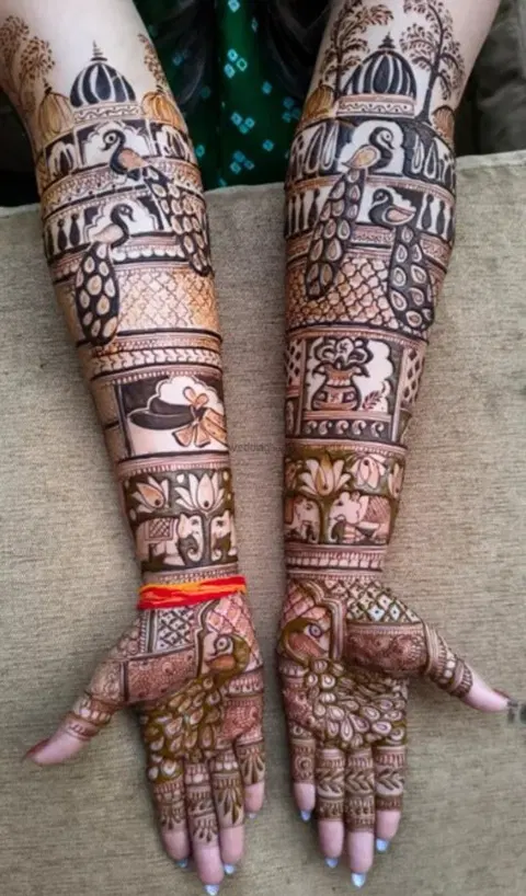 figure front hand mehndi design