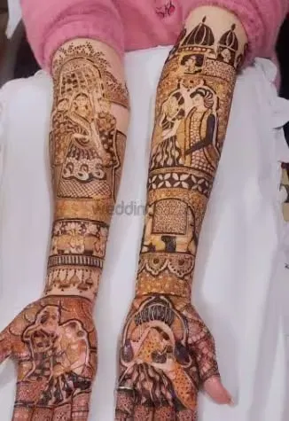 Heavy Front Hand Mehndi Design with Figures and Peacock (5)