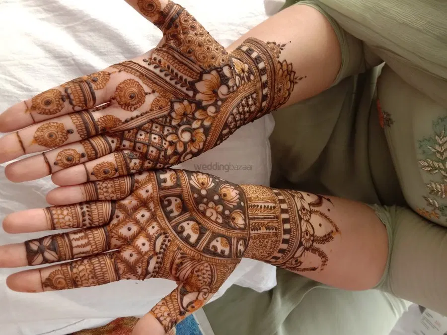 Back Hand Mehndi Design with Figures