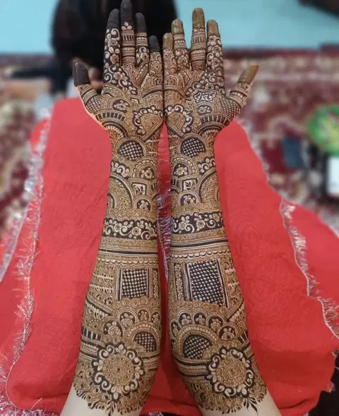 figure full hand mehndi design