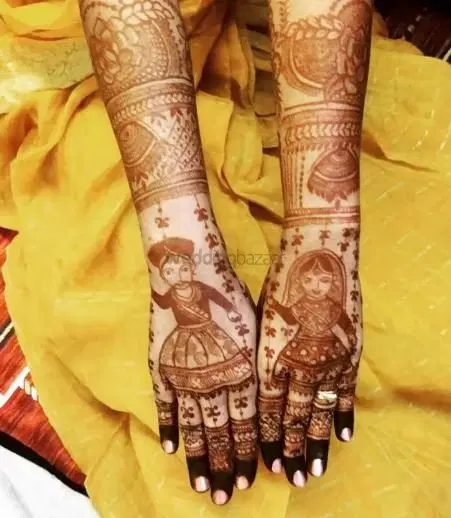 figure back hand mehndi design