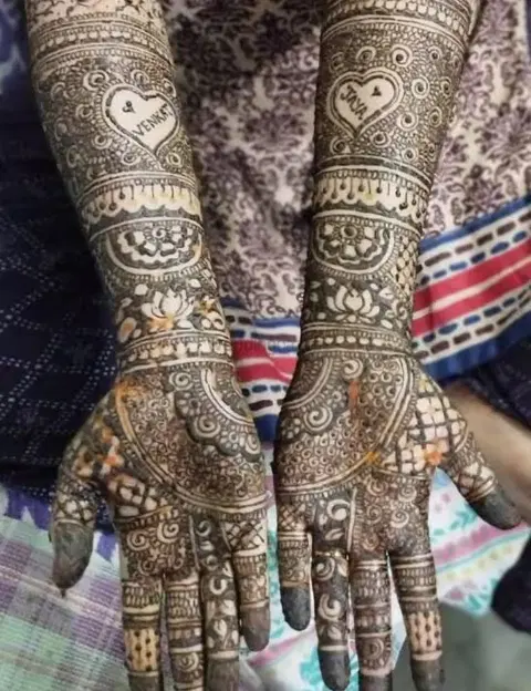 figure full hand mehndi design