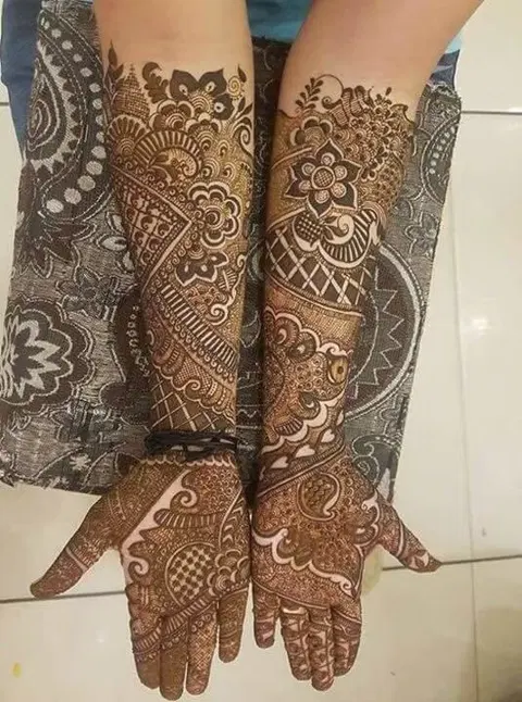 figure full hand mehndi design