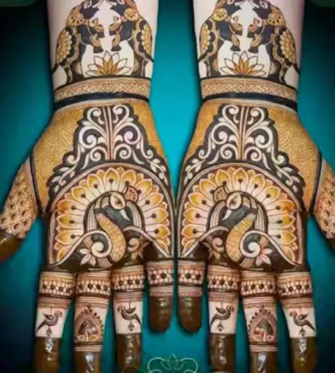 peacock front hand mehndi design