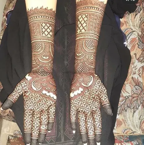 figure full hand mehndi design