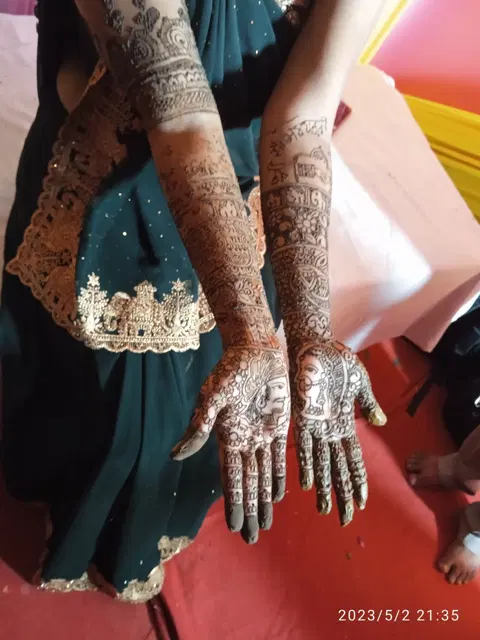 figure full hand mehndi design