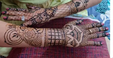 figure full hand mehndi design