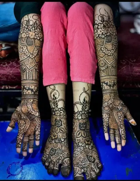 figure full hand mehndi design