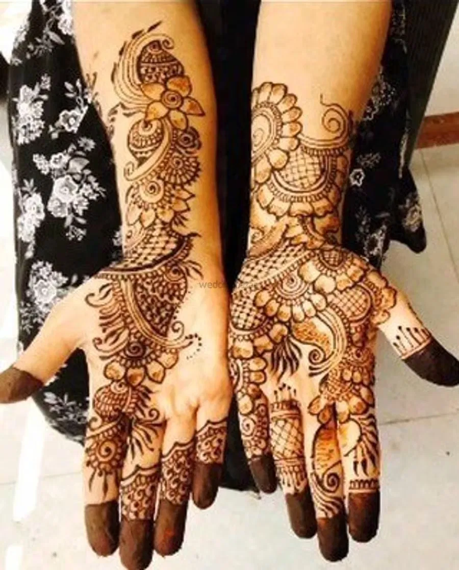 Back Hand Mehndi Design with Figures