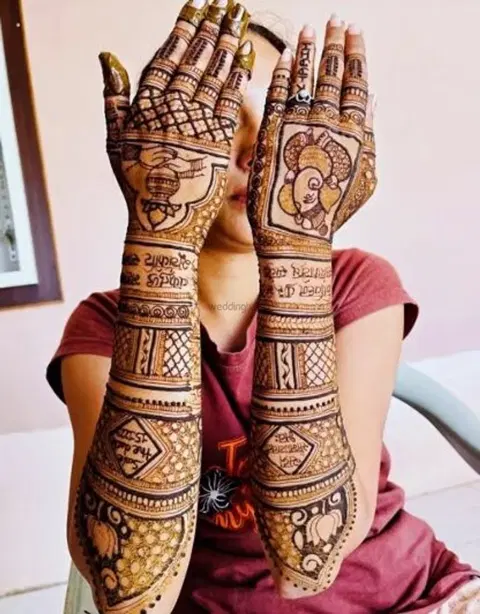 figure full hand mehndi design