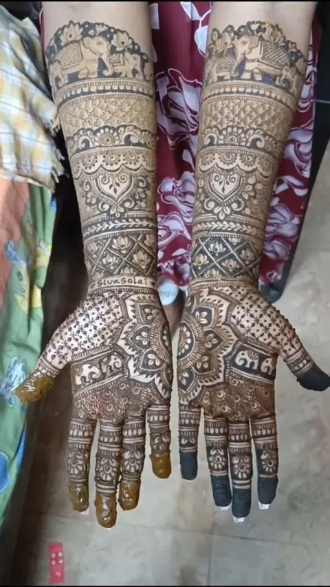 figure front hand mehndi design