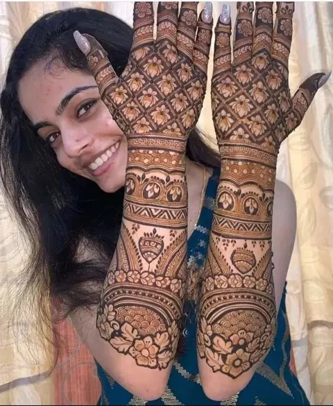 figure full hand mehndi design