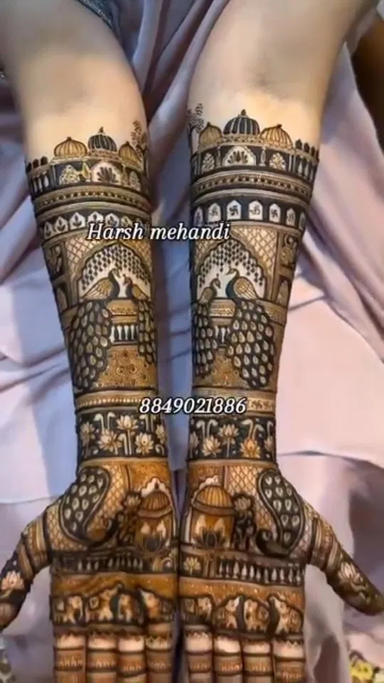 Aesthetic Bridal Mehndi Design with Figures, Hearts and Lotus