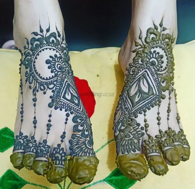 Back Hand Mehndi Design with Figures