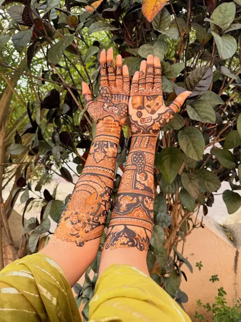 aesthetic bridal figure front hand mehndi design