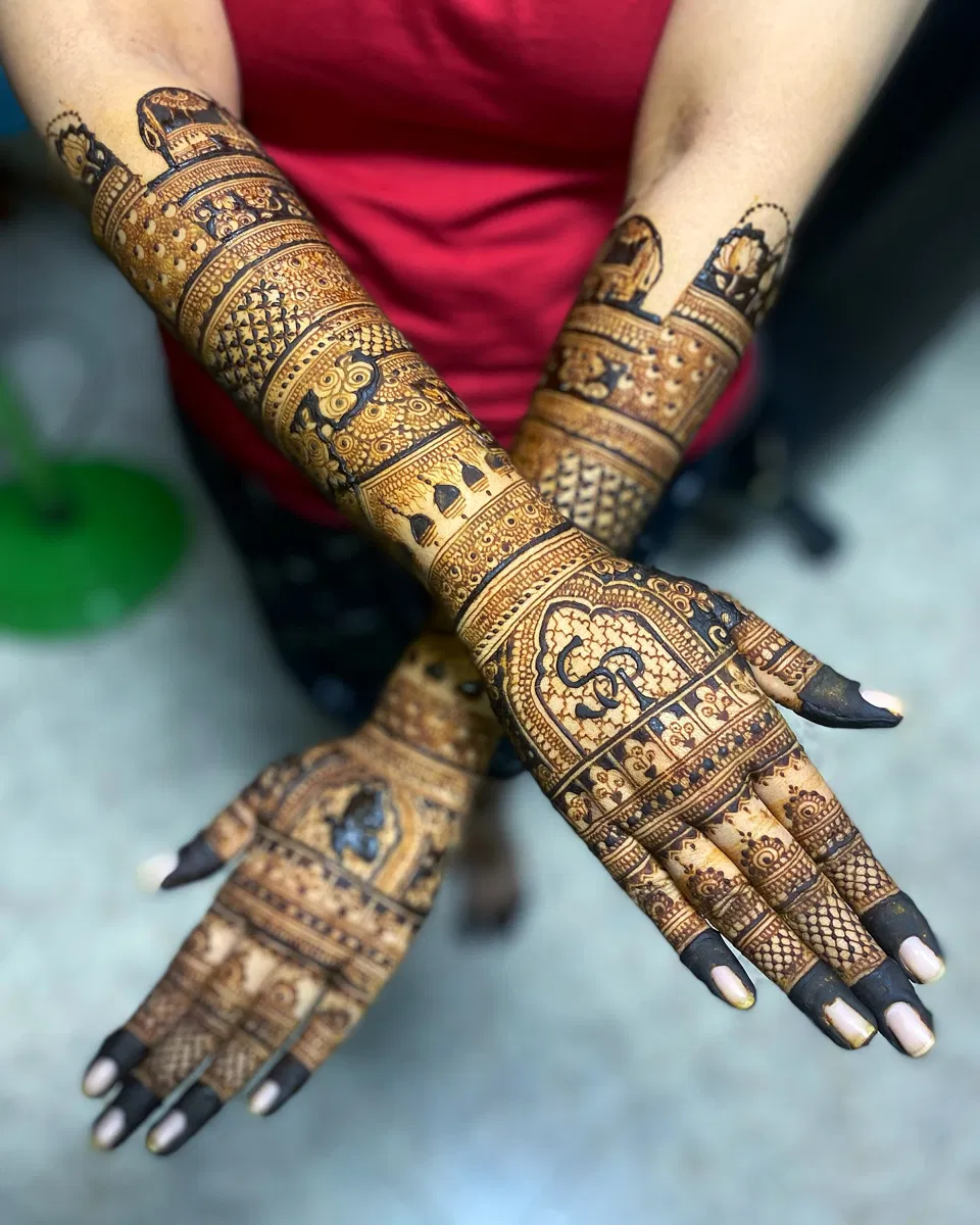 Bridal Back Hand Mehndi Design with Deity