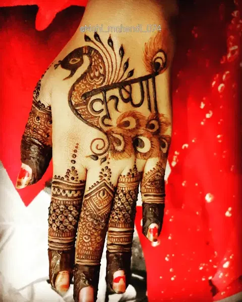peacock back hand mehndi design