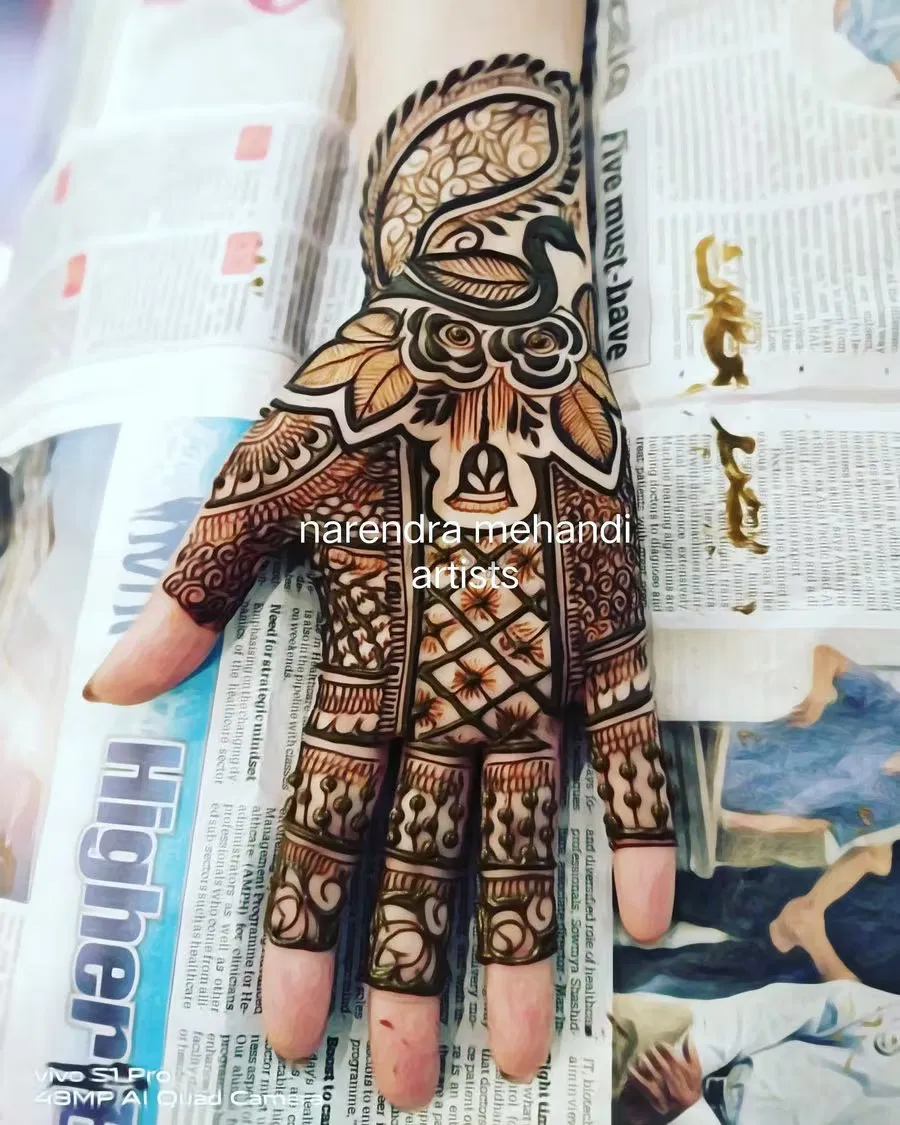Back Hand Mehndi Design with Figures