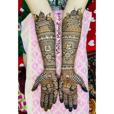 figure full hand mehndi design