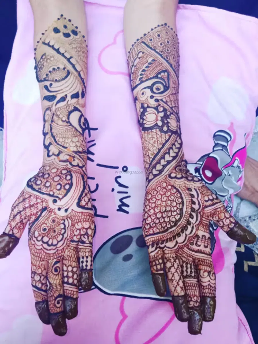 Back Hand Mehndi Design with Figures