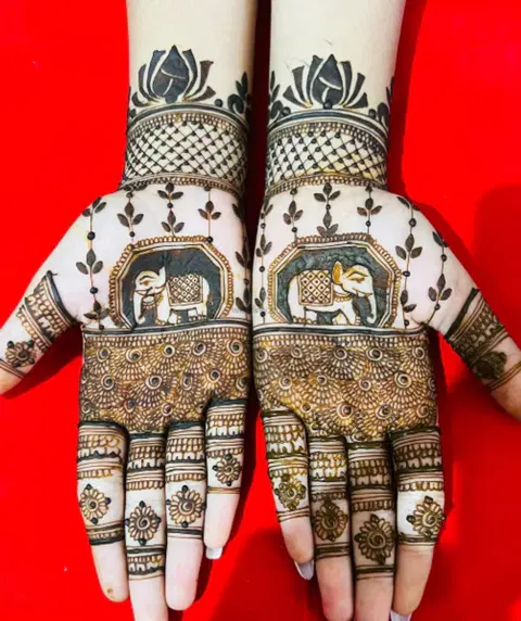figure full hand mehndi design