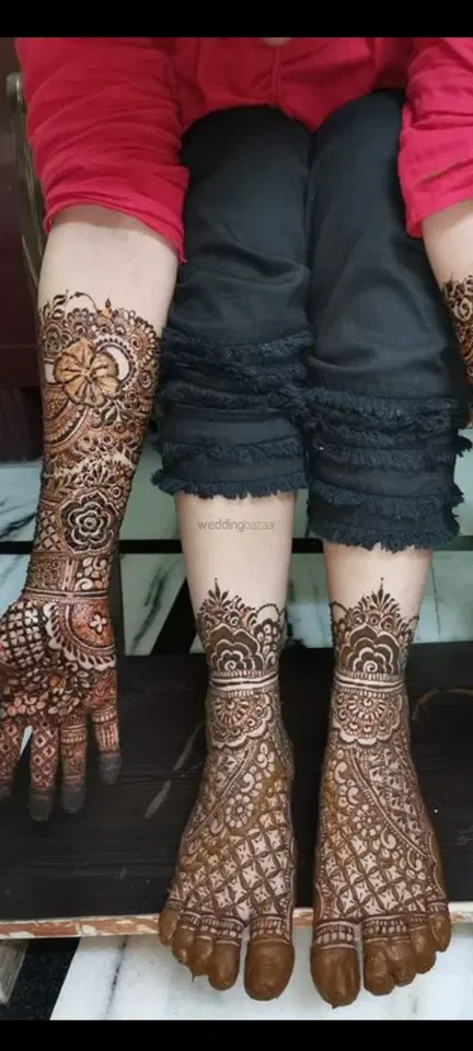 figure full hand mehndi design