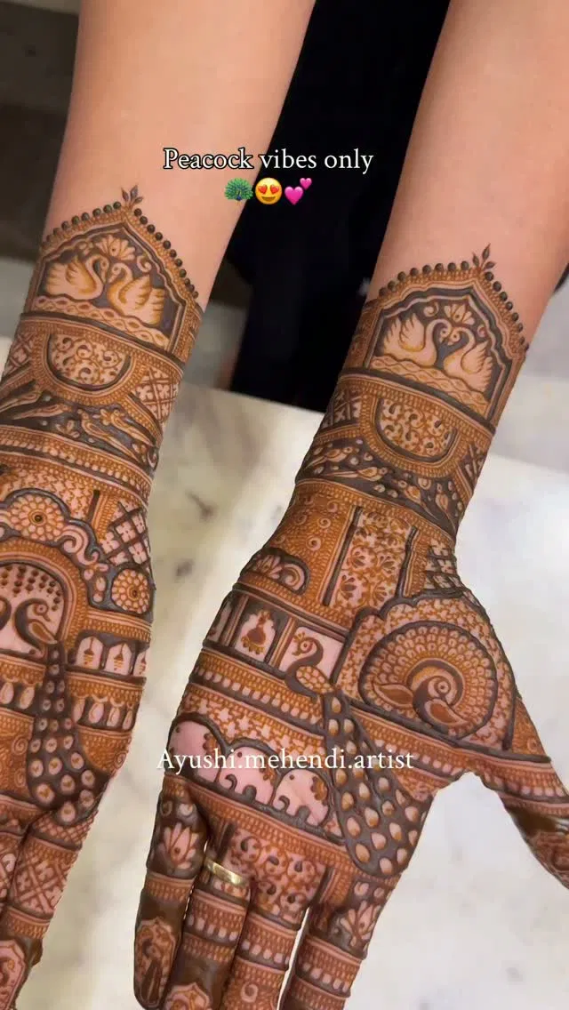 Bridal Indian Mehndi Design with Figures and Peacock