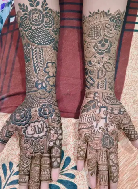 figure full hand mehndi design