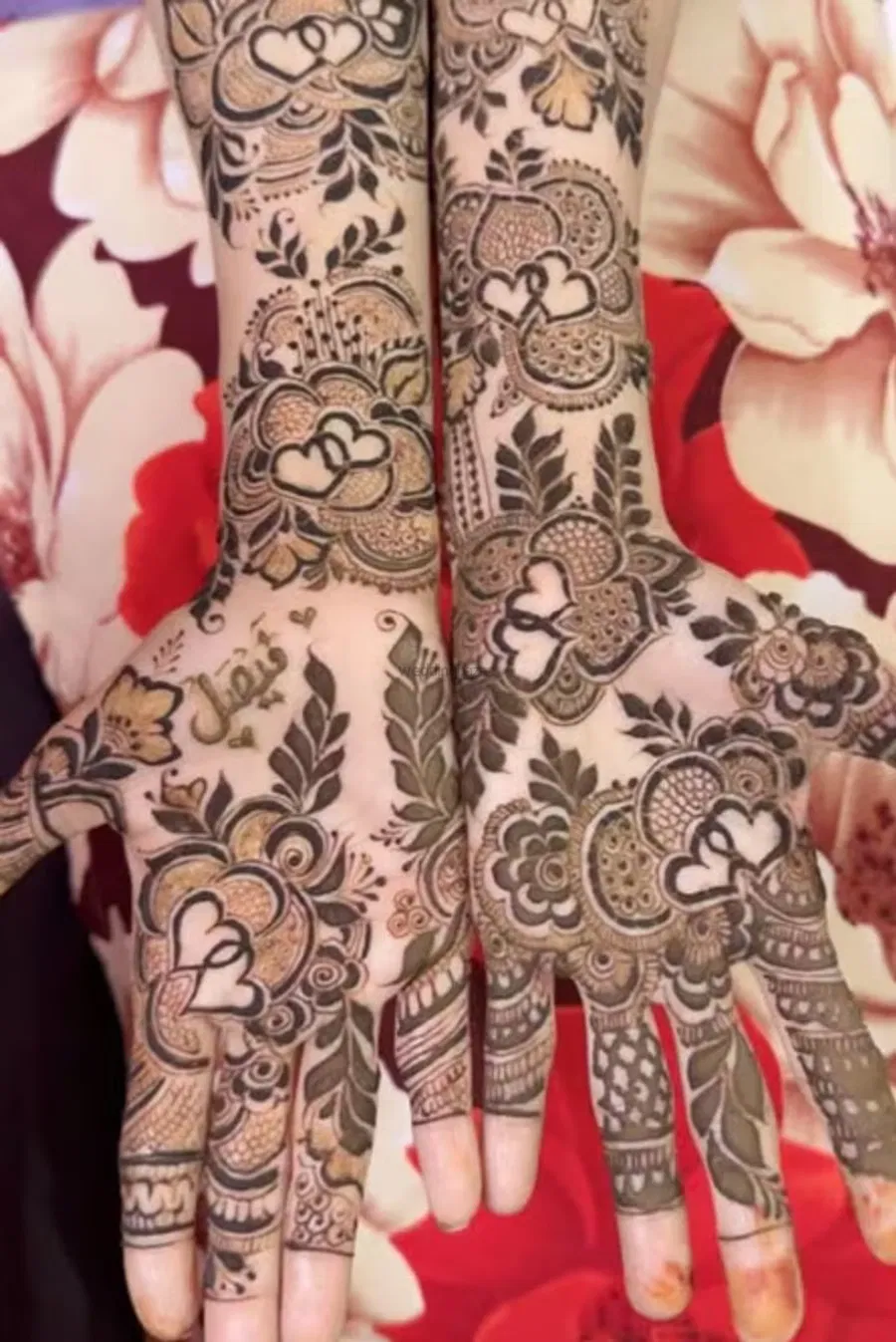 Mehndi Design with Figures and Hearts