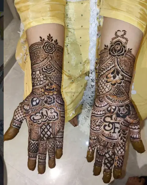figure full hand mehndi design