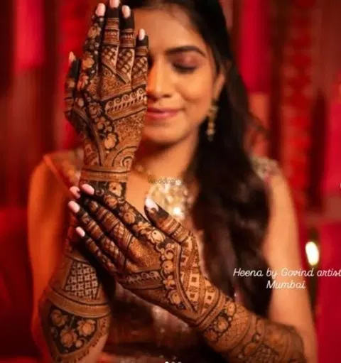 figure full hand mehndi design