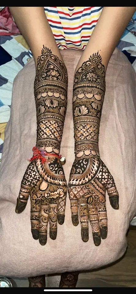figure full hand mehndi design