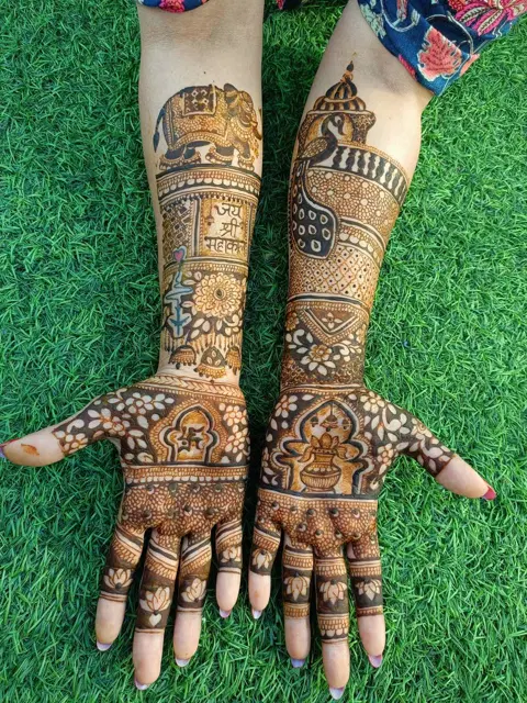 figure full hand mehndi design