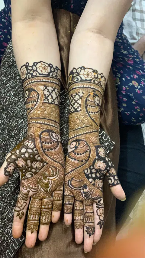 figure full hand mehndi design