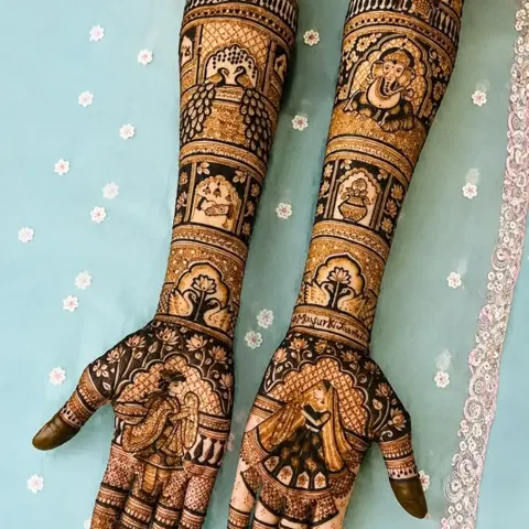 figure full hand mehndi design
