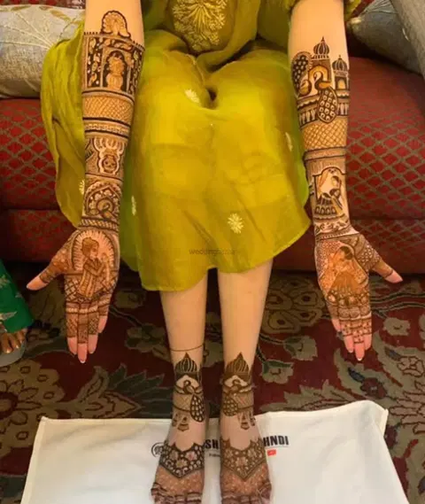 figure full hand mehndi design