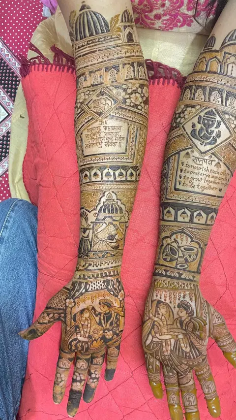 figure full hand mehndi design