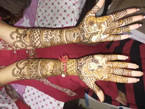 figure full hand mehndi design