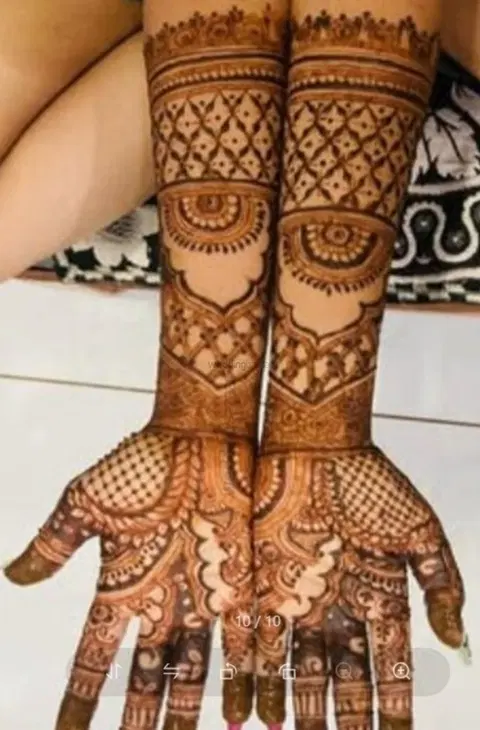 figure full hand mehndi design