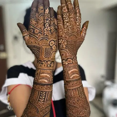 figure full hand mehndi design