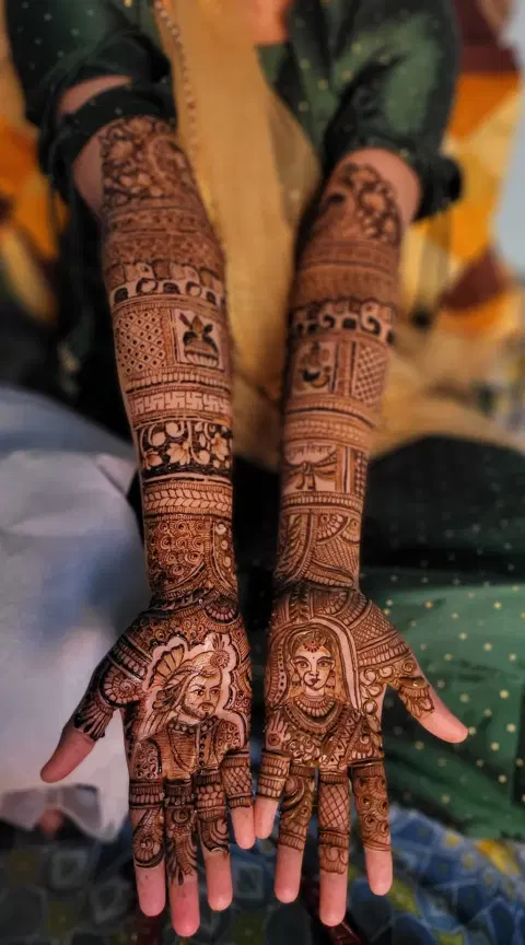 figure full hand mehndi design