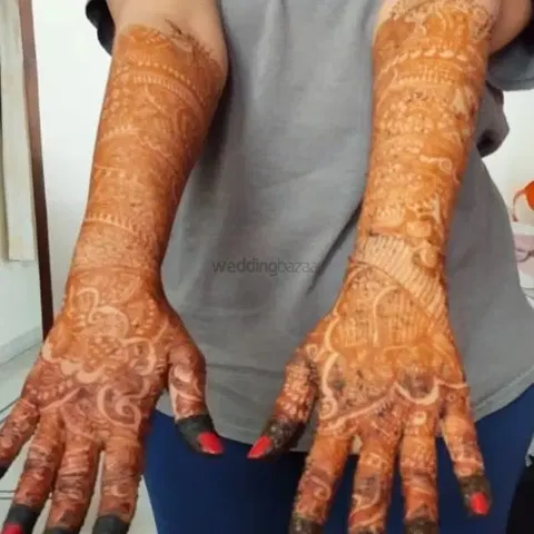 figure full hand mehndi design
