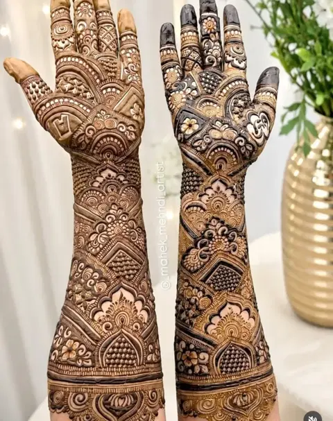 figure full hand mehndi design