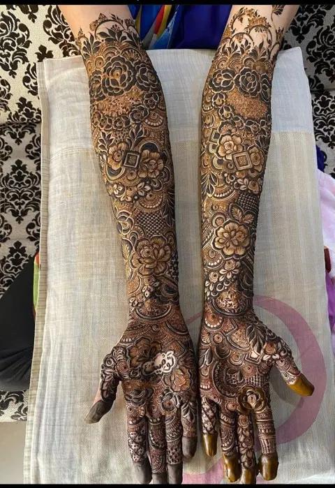 arabic bridal figure front hand mehndi design
