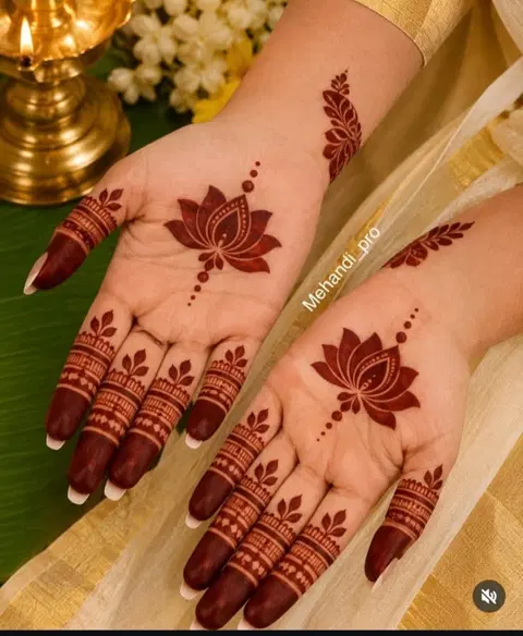 aesthetic minimal flower back hand mehndi design