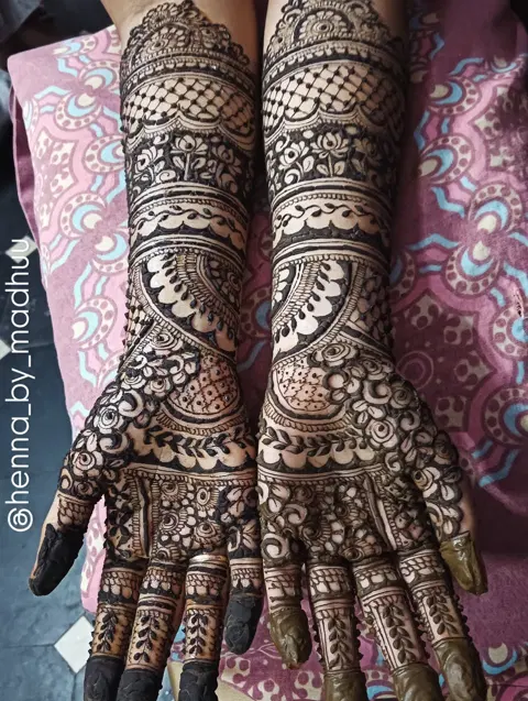 figure full hand mehndi design
