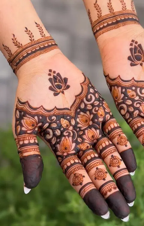 aesthetic bridal lotus back hand mehndi design